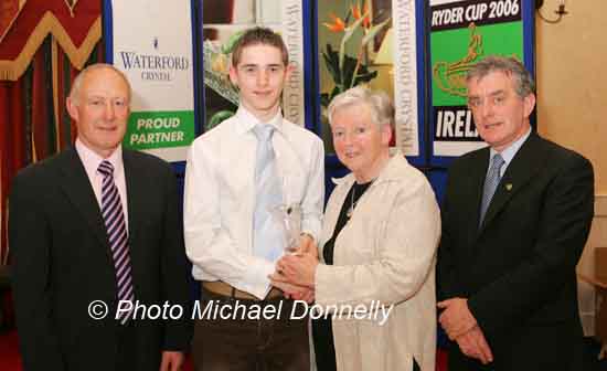 Eoin Hannon Tullamore AC is presented with his award at the Waterford Crystal A.A.I,  Juvenile Star Awards in the Belmont Hotel, Knock Co Mayo by  Breda Synott chairperson National Juvenile Committee AAI, included in photo are Michael Gaffney, Waterford Crystal (sponsor), and Patsy McGonagle Vice-president AAI Photo Michael Donnelly

