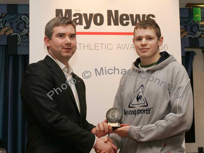  Gerard Kelly, Castlebar AC, International achievement winner, accepted his award from John Feerick, General Manager of The Mayo News. Photo:  Michael Donnelly