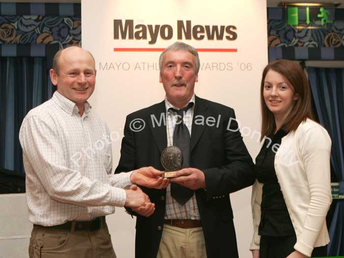 Gerry Kilroy, Westport AC accepted the Overall Club of the Year Award from Padraic Walsh, Treasurer Mayo Athletics Board, and Sinead O'Malley of the Mayo News at the Mayo News Mayo Athletic Awards, in Hotel Westport. Photo:  Michael Donnelly