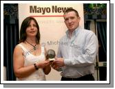 Liam Hastings of Westport AC accepted the Juvenile Track and Field Club of the Year Award from Marie O'Malley of the Mayo Athletics Board.
Photo:  Michael Donnelly