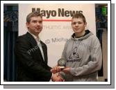  Gerard Kelly, Castlebar AC, International achievement winner, accepted his award from John Feerick, General Manager of The Mayo News. Photo:  Michael Donnelly