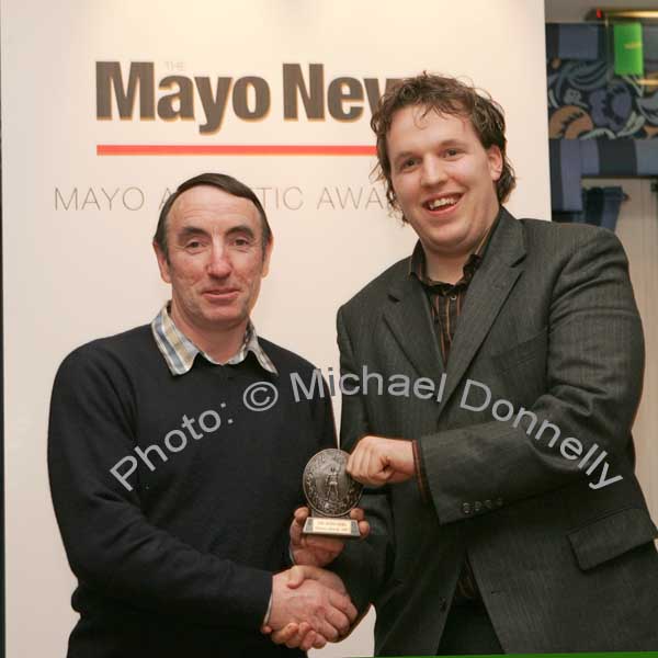 Juvenile Cross Country  Club winners. Joe McNulty of  Swinford AC accepted the award from Edwin McGreal of The Mayo News at Mayo News Mayo Athletic Awards in Hotel Westport. Photo:  Michael Donnelly