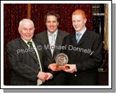 Oliver Dillon, chairman West Mayo GAA Board presents the Breaffy GAA Club Minor Player of the year award to Paul Curry at Breaffy GAA Annual Dinner Dance in Breaffy House Hotel,  Castlebar. Included in photo is team manager Edwin McGreal. Photo:  Michael Donnelly