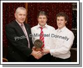 J.P. Lambe Treasurer Mayo GAA County Board presents the Breaffy GAA Club Senior Player of the year award to Kevin Scahill at the Breaffy GAA Annual Dinner Dance in Breaffy House Hotel, Castlebar. Included in photo is Breaffy Senior manager John Fahey. Photo:  Michael Donnelly