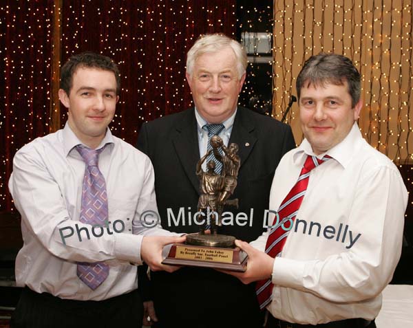 David Cusack on behalf of the players in the Breaffy senior panel makes a presentation to John Fahey, Senior team manager 2003- 2006 at Breaffy GAA Annual Dinner Dance in Breaffy House Hotel, Castlebar. Included in photo is club chairman Donal  Gallachoir. Photo:  Michael Donnelly