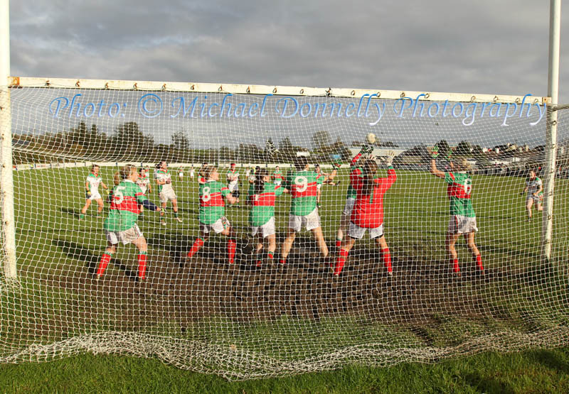  Cora Staunton  Carnacon, deflects the bullet of a free kick from St Bridgids Kiltoom,  over the bar in the Tesco Connacht Ladies Gaelic Football  Senior Club Championship final in Canon Gibbons Park Claremorris. Photo: © Michael Donnelly Photography