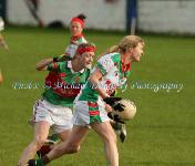 Laura Harrison St Brigids is put under pressure by Carnacon's Natasha Beegan in the Tesco Connacht Ladies Gaelic Senior Club Championship final in Canon Gibbons Park Claremorris. Photo: © Michael Donnelly Photography