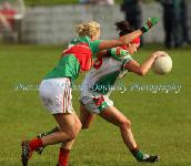 Carnacon's Aoife Loftus adn Claire Grehan St Brigids in action in the Tesco Connacht Ladies Gaelic Senior Club Championship final in Canon Gibbons Park Claremorris. Photo: © Michael Donnelly Photography