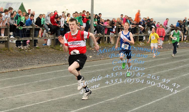 John Byrne, Belmullet area,  leads the field home in the Boys U14 100m followed by Niall Joyce Claremorris  at Mayo Community Games Athletic Finals at Claremorris Track. Photo:Michael Donnelly