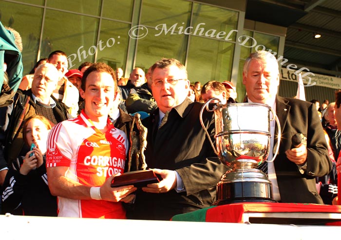 Pat Jennings, TF Royal Hotel and Theatre. (sponsor) presents Alan Dillon with the Man of the Match award in the TF Royal Hotel and Theatre Mayo Senior Football Championship final in McHale Park Castlebar, included in photo on right is James Waldron, Chairman Mayo GAA Count Board. Photo: © Michael Donnelly
 
 Mayo Senior Football Championship final in McHale Park