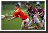 Neil Douglas, Castlebar Mitchels. gets the ball away, as Crossmolina apply pressure in the Ulster Bank U-21A County Football Championship final in Fr O'Hara Park Charlestown. Photo:  Michael Donnelly