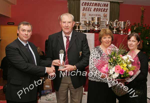 Tom Jordan makes a presentation to Cathal Prior, chairman Crossmolina Deel Rovers and Carmel Prior is presented with a bouquet of flowers by Ann Maire Haran, (Assistant Sec) at the Crossmolina Deel Rovers Dinner Dance in Hiney's Upper Deck, Crossmolina