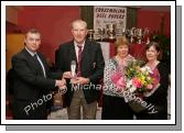 Tom Jordan makes a presentation to Cathal Prior, chairman Crossmolina Deel Rovers and Carmel Prior is presented with a bouquet of flowers by Ann Maire Haran, (Assistant Sec) at the Crossmolina Deel Rovers Dinner Dance in Hiney's Upper Deck, Crossmolina
