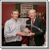 Thomas Loftus accepts an Acknowledgment award on behalf of his  brother Padraig Loftus of ADTEC (team sponsors) Cathal Prior, chairman Crossmolina Deel Rovers (on right) presents the Senior Player of the Year award to Joe Keane at the Crossmolina Deel Rovers Dinner Dance in Hiney's Upper Deck, Crossmolina. Photo:  Michael Donnelly