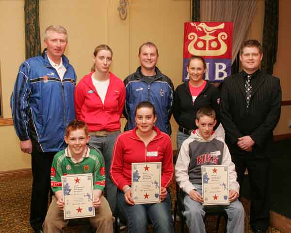 Belmullet GAA Club "Stars of the Future" pictured at AIB Sponsored presentation night in the Failte Suite, Welcome Inn Hotel, Castlebar, front from left: Eamon McAndrew, Belmullet, Nichole Healy, Pullathomas, and Thomas Duffy Belmullet; at back: Eugene Lavin, Cora Staunton, Billy McNicholas, Triona McNicholas, and Ivan Kelly AIB Bank. Photo Michael Donnelly.