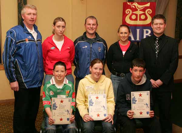 Claremorris GAA Club "Stars of the Future" pictured at AIB Sponsored presentation night in the Failte Suite, Welcome Inn Hotel, Castlebar, front from left: Ian Stagg, Edel Nolan, and Stephen Commins; At back: Eugene Lavin, Cora Staunton, Billy McNicholas, Triona McNicholas, and Ivan Kelly AIB Bank. Photo Michael Donnelly.