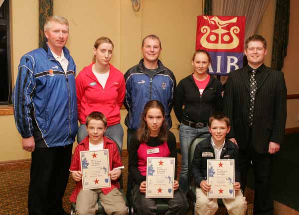 Aughamore GAA Club "Stars of the Future" pictured at AIB Sponsored presentation night in the Failte Suite, Welcome Inn Hotel, Castlebar, front from left: Michael Caulfield, Kilkelly; Siobhan Garvey Aughamore and  Fergal Boland Tooreen;
 at back: Eugene Lavin, Cora Staunton, Billy McNicholas, Triona McNicholas, and Ivan Kelly AIB Bank. Photo Michael Donnelly.
