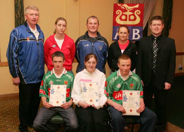 Louisburgh GAA Club "Stars of the Future" pictured at AIB Sponsored presentation night in the Failte Suite, Welcome Inn Hotel, Castlebar, front from left: Michael Gibbons, Ballyhip; Niamh Gibbons, Carniskey and John Needham Carniskey at back: Eugene Lavin, Cora Staunton, Billy McNicholas, Triona McNicholas, and Ivan Kelly AIB Bank. Photo Michael Donnelly.