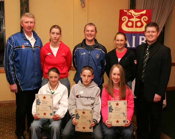 Westport GAA Club "Stars of the Future" pictured at AIB Sponsored presentation night in the Failte Suite, Welcome Inn Hotel, Castlebar, front from left: Lisa Tully, Mark Barrett, and Emma Kilkelly at back: Eugene Lavin, Cora Staunton, Billy McNicholas, Triona McNicholas, and Ivan Kelly AIB Bank. Photo Michael Donnelly.