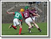 Westmeath's Andrew Mitchell  is pursued by Mayo's Rory Campion in the Christy Ring Cup in McHale Park, Castlebar. Photo:  Michael Donnelly