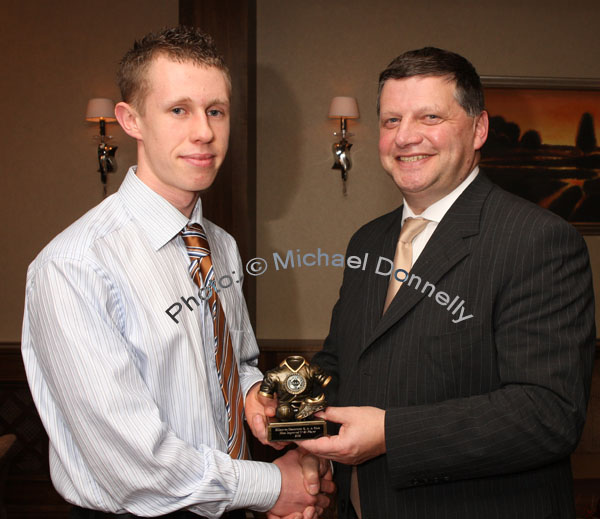 John O'Mahony presents the " Most Improved U-21 Player of the Year" award to John Hunt at the Kilmovee Shamrocks Football Club annual Dinner in The Abbeyfield Hotel, Ballaghaderreen. Photo:  Michael Donnelly