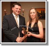 John O'Mahony presents the "Most Improved Player" award to Sinead Cafferky at the Kilmovee Shamrocks Ladies Gaelic Football Club annual Dinner in The Abbeyfield Hotel, Ballaghaderreen.Photo:  Michael Donnelly