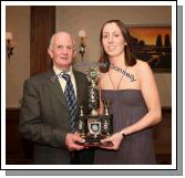 John Towey presents the "Young Player of the Year" award to Michelle Kelly, at the Kilmovee Shamrocks Ladies Gaelic Football Club annual Dinner in The Abbeyfield Hotel Ballaghaderreeen. Photo:  Michael Donnelly