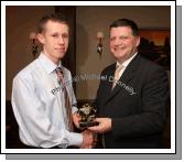 John O'Mahony presents the " Most Improved U-21 Player of the Year" award to John Hunt at the Kilmovee Shamrocks Football Club annual Dinner in The Abbeyfield Hotel, Ballaghaderreen. Photo:  Michael Donnelly