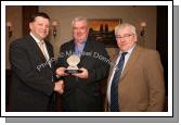 John O'Mahony presents an "Outstanding Service" award to Joe Regan at the Kilmovee Shamrocks Football Club annual Dinner in The Abbeyfield Hotel,  Ballaghaderreen, included in photo is John Caulfield, Kilmovee Shamrocks Club vice-chairman.Photo:  Michael Donnelly