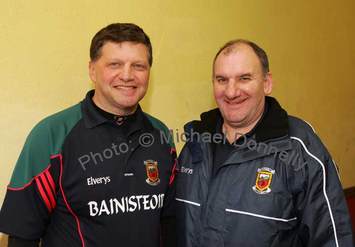 Mayo manager John O'Mahony and Tommy Goonan, a member of the Mayo backroom team,
in happy mood as they leave An Sportlann, Castlebar after the Mayo v Kerry game in McHale Park on Sunday last. Photo:  Michael Donnelly