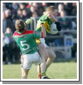 Andy Moran gets the "Elbow Treatment" in the 1st round of the Allianz National Football League between Mayo and Kerry, at McHale Park last Sunday. Photo:  Michael Donnelly