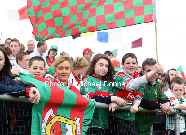 Bonniconlon supporters raise the flag for Mayo at the ESB All Ireland Minor Football Final replay in Pearse Park, Longford. Photo:  Michael Donnelly