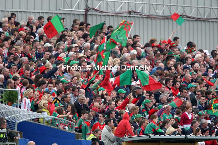 Mayo Supporters wave the flag  after Mayo add to the scoreboard at the ESB All Ireland Minor Football Final replay in Pearse Park, Longford.Photo:  Michael Donnelly