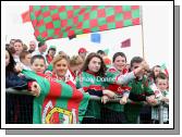 Bonniconlon supporters raise the flag for Mayo at the ESB All Ireland Minor Football Final replay in Pearse Park, Longford. Photo:  Michael Donnelly