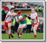 Cathal Freeman gets a Glove in the face at the ESB All Ireland Minor Football Final replay in Pearse Park, Longford.Photo:  Michael Donnelly