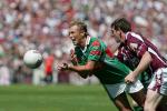 Ciaran McDonald gets this ball  away at the ConnachtSenior  Football Championship Final in Pearse Stadium, Photo Michael Donnelly