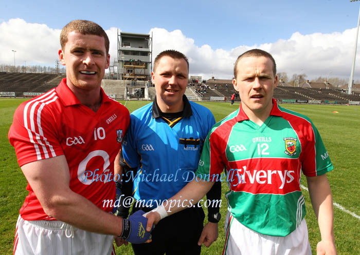 Referee Rory Hickey pictured with captains Fintan Goold, Cork and Andy Moran, Mayo in the 2011 Allianz Football League Division 1 Round 6 in McHale Park