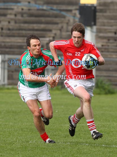 Mayo's Alan Dillon gives chase to Cork's Sean Kiely in the 2011 Allianz Football League Division 1 Round 6 in McHale Park, Castlebar.Photo:Michael Donnelly