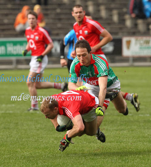  Cork's Michael Shields loses his balance in the 2011 Allianz Football League Division 1 Round 6 in McHale Park, Castlebar. Photo:Michael Donnelly, 