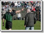 Referee Michael Hughes sends off this Dublin supporter for pitch encroachment in the 2007 Allianz National Football League Div 1A round 6 in McHale Park Castlebar. Photo:  Michael Donnelly