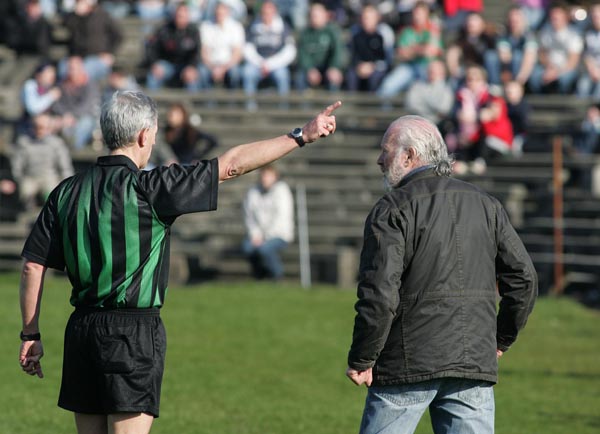Referee Michael Hughes sends off this Dublin supporter for pitch encroachment in the 2007 Allianz National Football League Div 1A round 6 in McHale Park Castlebar. Photo:  Michael Donnelly