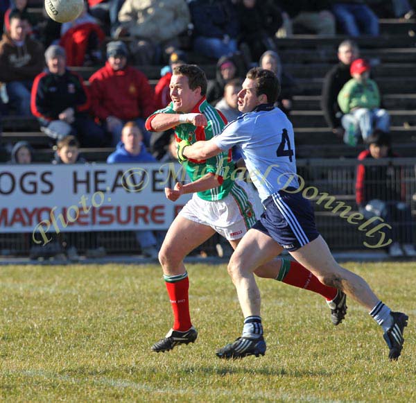 Mayo's Andy Moran clears  his lines  despite attention of  Dublin's Philip McMahon in the Allianz GAA Football National League Division 1 Round 3 in McHale Park, Castlebar. Photo:  Michael Donnelly