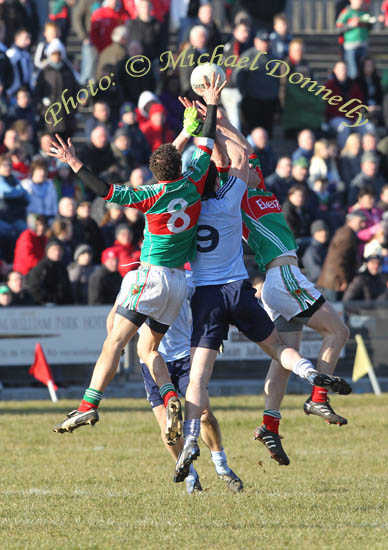Mayo's Tom Parsons goes highest in this aerial battle in the Allianz GAA Football National League Division 1 Round 3 in McHale Park Castlebar Castlebar. Photo:  Michael Donnelly