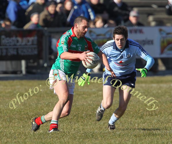 Mayo's captain, Trevor Mortimer gets by Dublin's Hugh Gill, in the Allianz GAA Football National League Division 1 Round 3 in McHale Park,  Castlebar. Photo:  Michael Donnelly