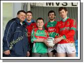 Tom Dawson, Sancta Maria College Louisburgh is presented with a Football by Mayo  goalkeeper David Carke, at the Allianz GAA Football National League Division 1 Round 3 in McHale Park, Castlebar, included in photo are Mayo Senior Team manager John O'Mahony, Aidan Kilcoyne and Kevin MacLoughlin.Photo:  Michael Donnelly