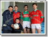 Darren Moffatt, Glencorrib National School is presented with a Football by Mayo Senior Team manager John O'Mahony at the Allianz GAA Football National League Division 1 Round 3 in McHale Park, Castlebar, included in photo are Aiden Kilcoyne, Kevin McLoughlin and David Clarke. Photo:  Michael Donnelly