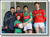 Alisha Conway, St Peters  National School, Snugboro is presented with a Football by Kevin McLoughlin at the Allianz GAA Football National League Division 1 Round 3 in McHale Park, Castlebar, included in photo are Mayo Senior Team manager John O'Mahony, Aidan Kilcoyne and David Clarke. Photo:  Michael Donnelly