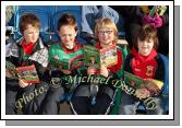 Checking the  programme lineout at the Allianz GAA Football National League Division 1 Round 3 in McHale Park, Castlebar on Sunday last were from left: Conal & Patrick Caulfield, Darragh Healy and  Joshua Webb, Ballyhaunis. Photo:  Michael Donnelly