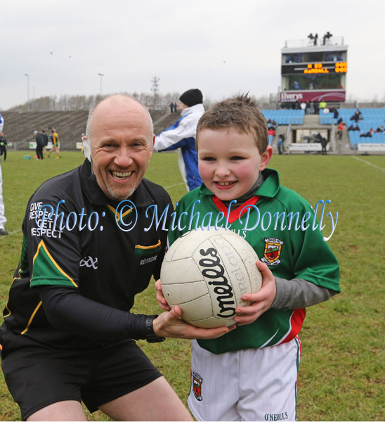 Referee Marty Duffy is presented with the ball by Mayo Mascot for the Day- Brendan Murphy, Knockmore, in the 2013 Allianz Football League Div 1 Round 6 in Elverys MacHale Park Castlebar. Photo: © Michael Donnelly