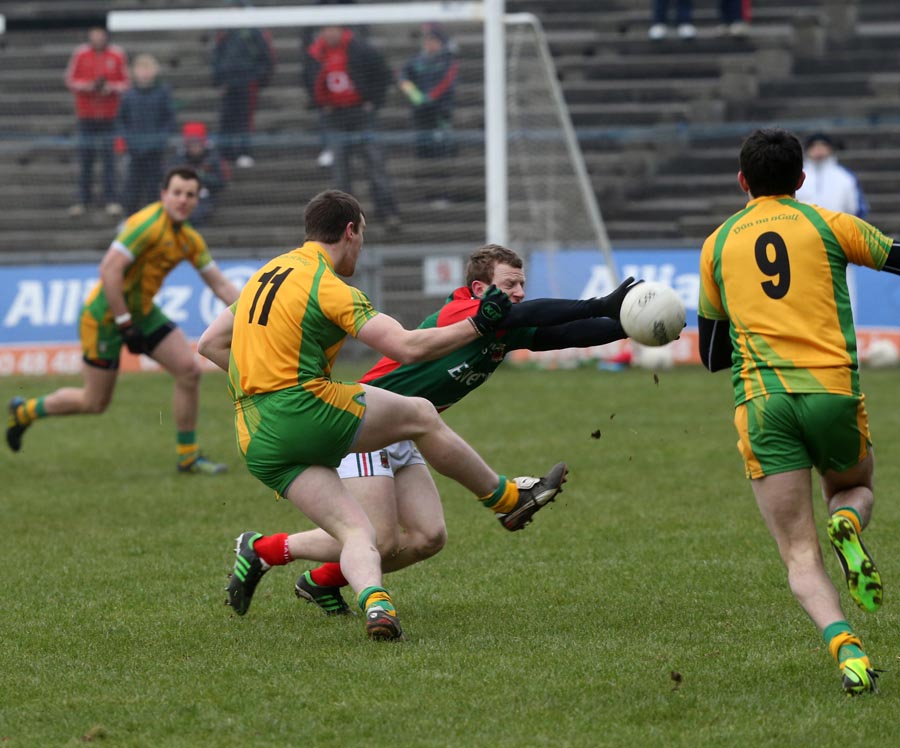 Mayo's Colm Boyle blocks this shot from Donegal's Ryan Bradley at the 2013 Allianz Football League Div 1 Round 6 in Elverys MacHale Park Castlebar. Photo: © Michael Donnelly